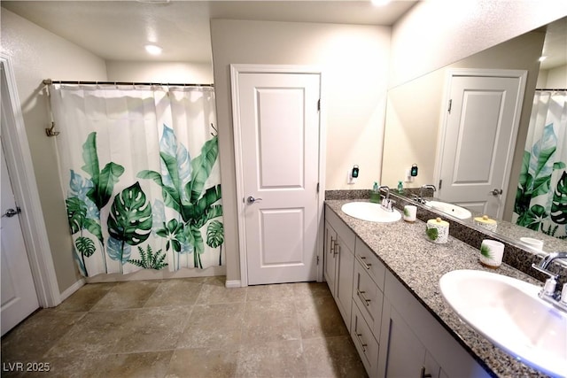 bathroom with a shower with curtain and vanity