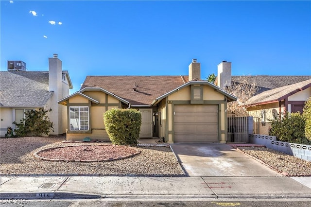 ranch-style house featuring a garage