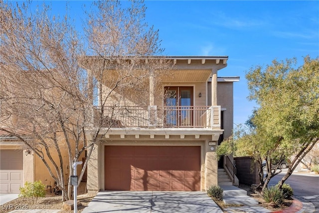 view of front of property with a balcony and a garage