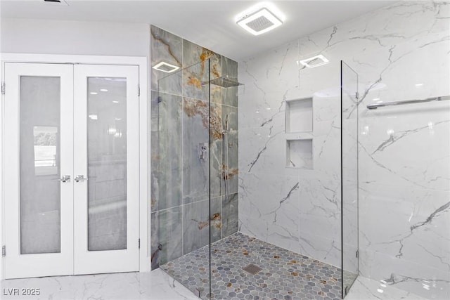 bathroom featuring walk in shower and french doors