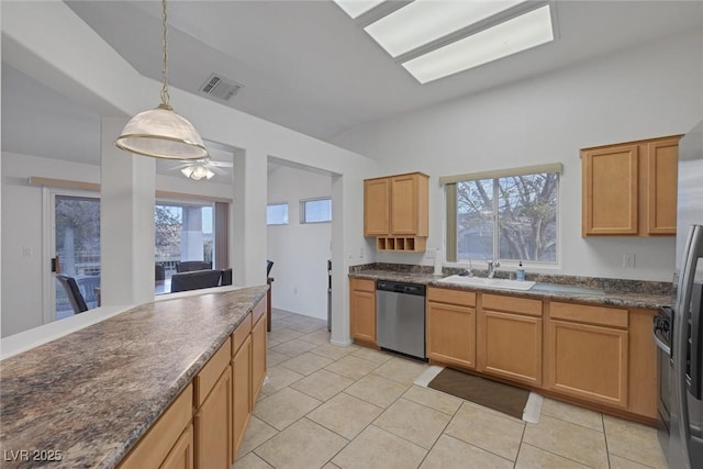 kitchen with a wealth of natural light, dishwasher, pendant lighting, and sink