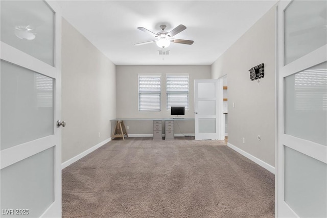 interior space featuring carpet, ceiling fan, and french doors