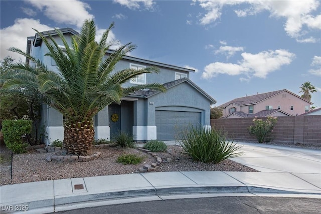 view of front of property with a garage