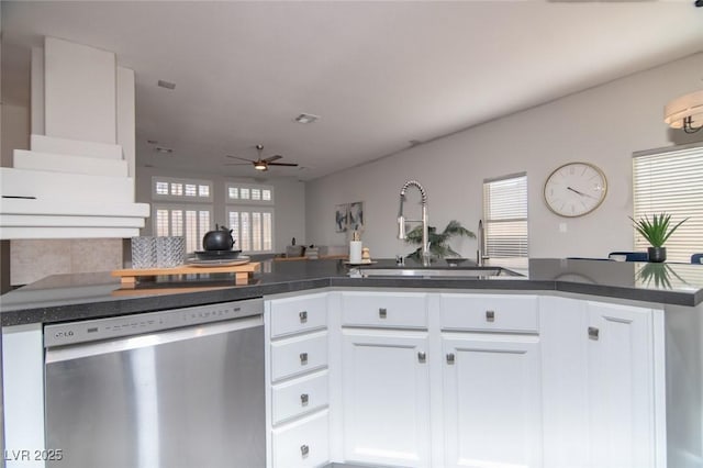 kitchen with white cabinetry, dishwasher, ceiling fan, sink, and kitchen peninsula