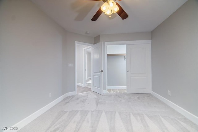 unfurnished bedroom with light carpet, a closet, and ceiling fan