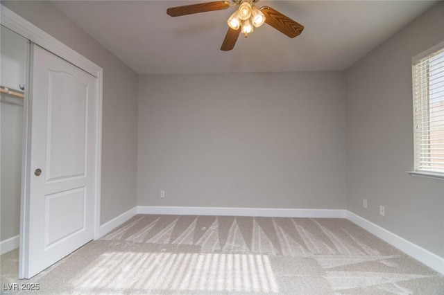 interior space featuring ceiling fan