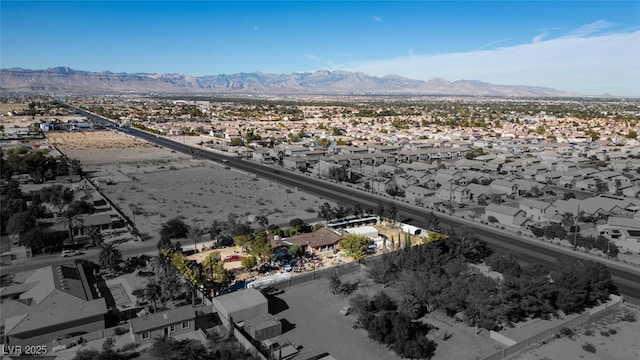 bird's eye view with a mountain view