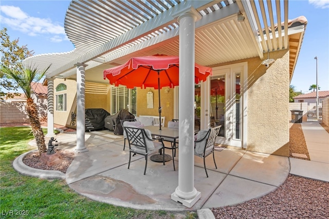 view of patio / terrace featuring a pergola and french doors