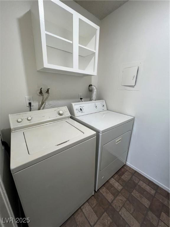 laundry area with independent washer and dryer