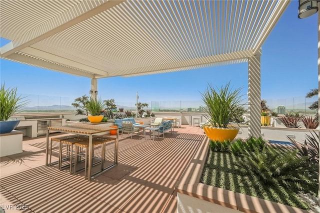 view of patio featuring a pergola and an outdoor hangout area