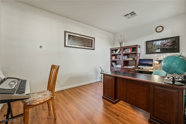 office space featuring light hardwood / wood-style floors