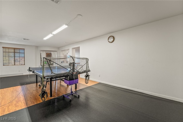 game room featuring hardwood / wood-style floors