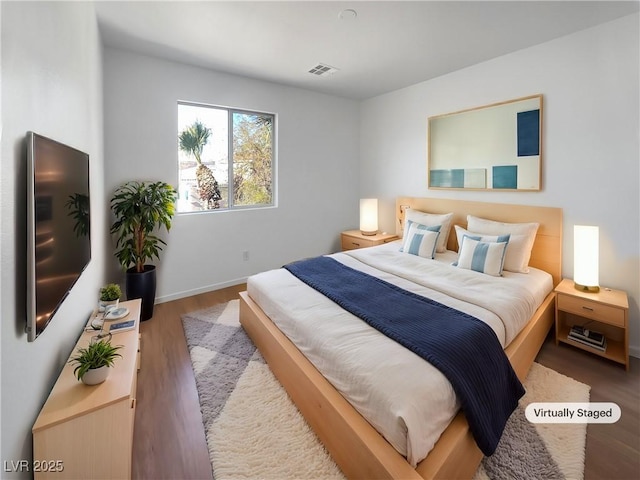 bedroom with light hardwood / wood-style floors