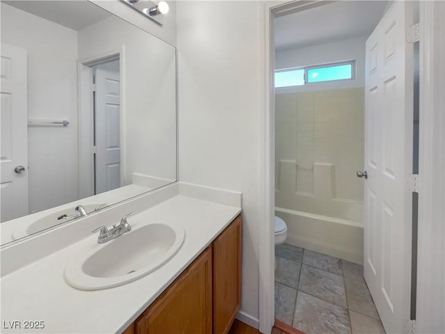 full bathroom featuring bathing tub / shower combination, vanity, and toilet