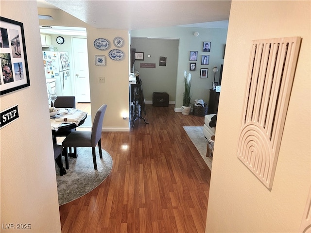 dining area featuring dark hardwood / wood-style flooring