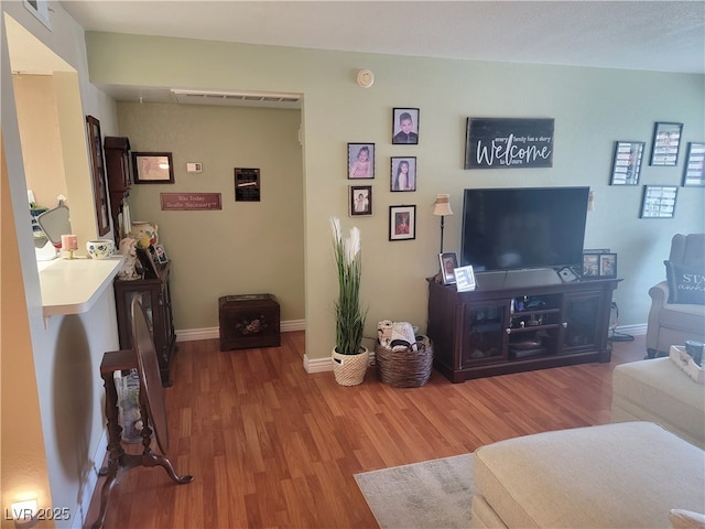 living room featuring hardwood / wood-style flooring