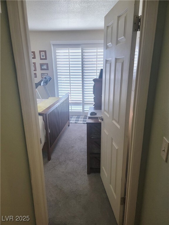 bathroom with a textured ceiling