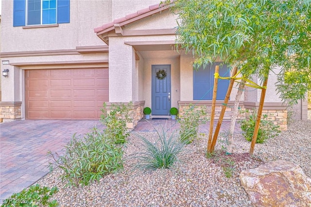 property entrance with a garage