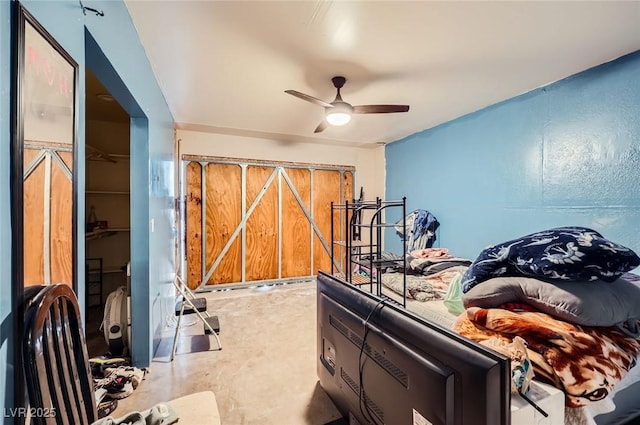 bedroom featuring concrete flooring and ceiling fan