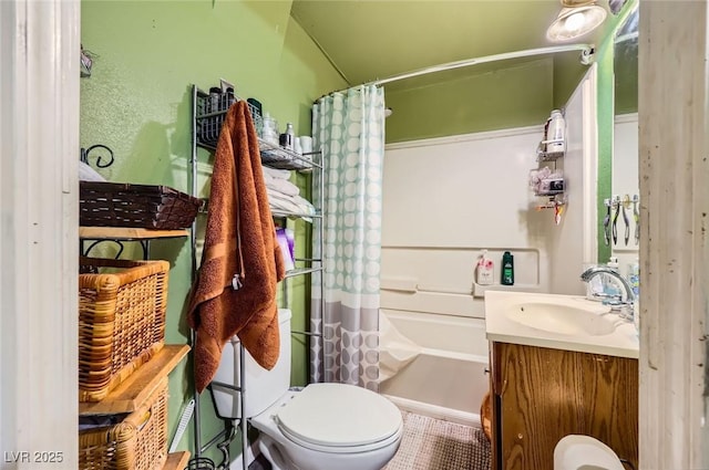 bathroom featuring vanity, toilet, and shower / bath combo