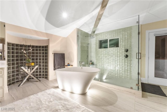 bathroom with beamed ceiling and shower with separate bathtub