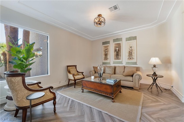 living room featuring parquet floors