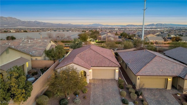 drone / aerial view featuring a mountain view