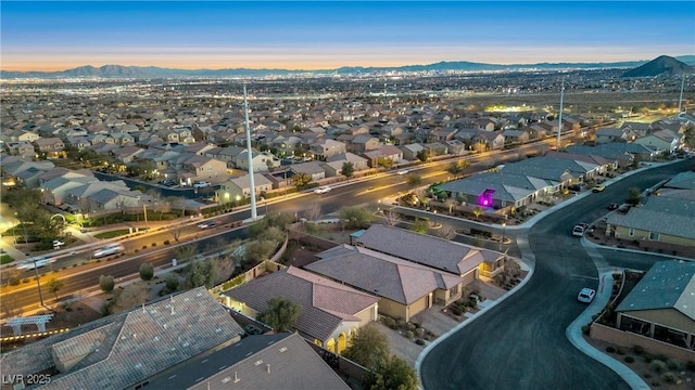 aerial view at dusk with a mountain view