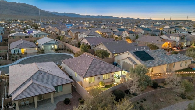 aerial view at dusk with a mountain view