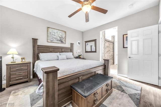 bedroom featuring ceiling fan and light wood-type flooring