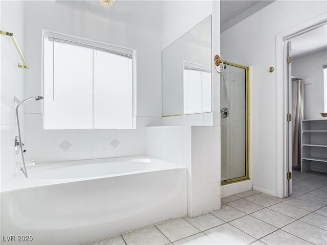 bathroom featuring separate shower and tub and tile patterned floors