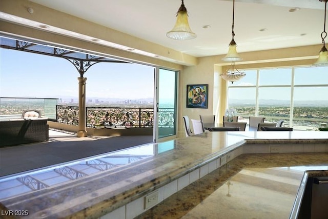 interior space featuring hanging light fixtures