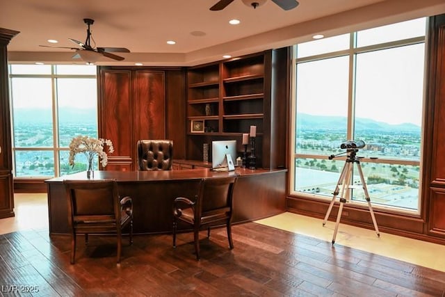 office space with wood-type flooring