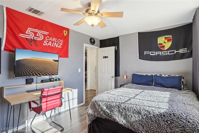 bedroom featuring dark hardwood / wood-style flooring and ceiling fan