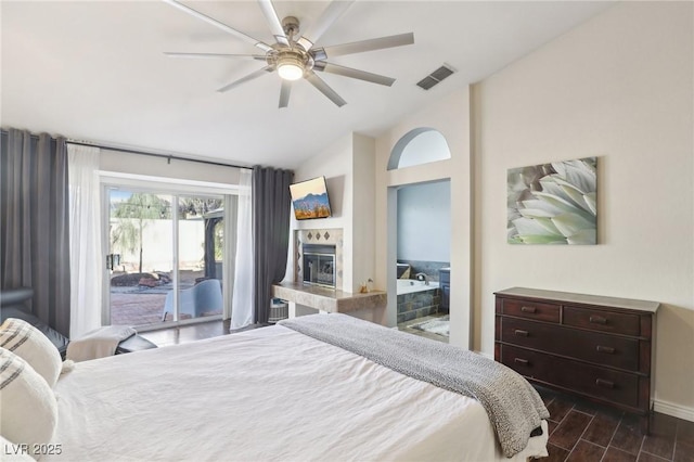 bedroom with access to exterior, ceiling fan, and vaulted ceiling