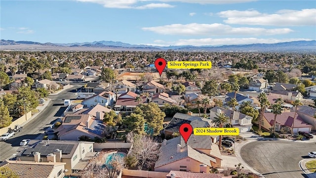 aerial view featuring a mountain view