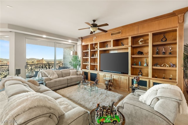 living room featuring ceiling fan