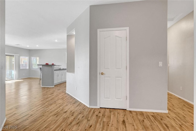 5919 Pavilion Lakes Ave, Las Vegas, NV 89122 - unfurnished living room featuring light wood finished floors and recessed lighting