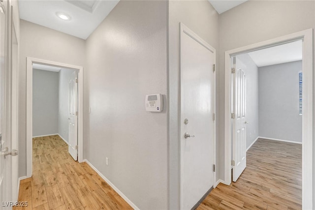 5919 Pavilion Lakes Ave, Las Vegas, NV 89122 - corridor featuring light wood finished floors