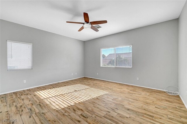 5919 Pavilion Lakes Ave, Las Vegas, NV 89122 - spare room with wood finished floors and a ceiling fan