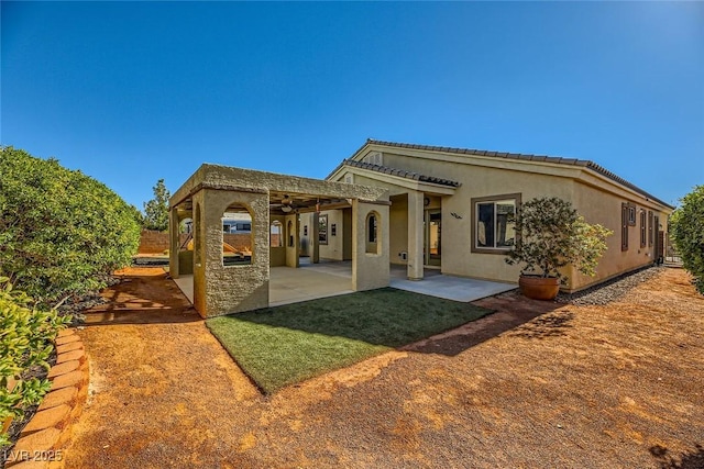 rear view of house with a patio area