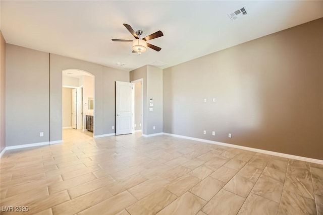 spare room with ceiling fan