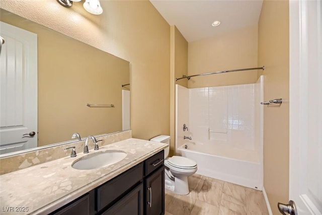 full bathroom with shower / tub combination, vanity, and toilet