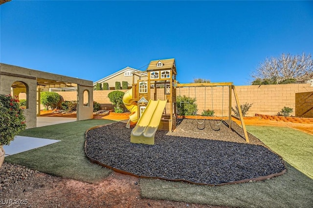 view of playground with a yard