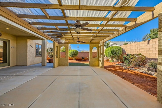 view of patio / terrace with a pergola and ceiling fan