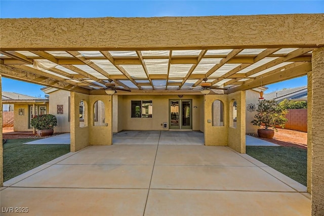 view of patio / terrace featuring ceiling fan