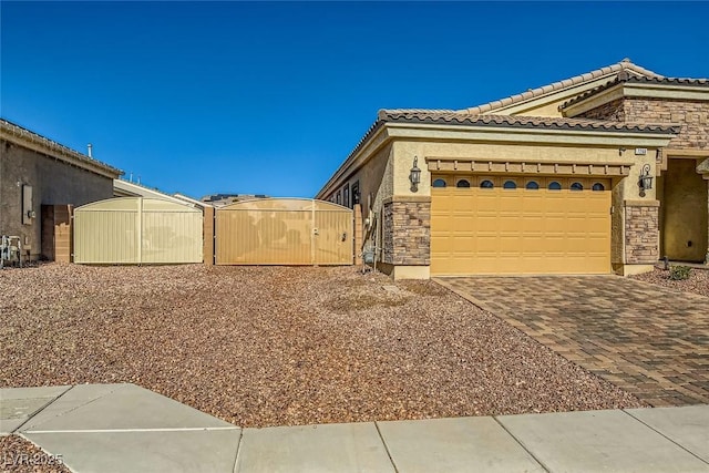 view of side of property with a garage