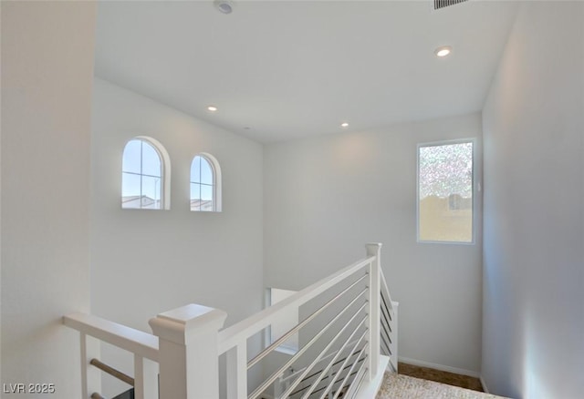 stairs featuring a wealth of natural light