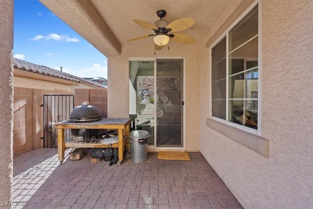 view of patio with ceiling fan