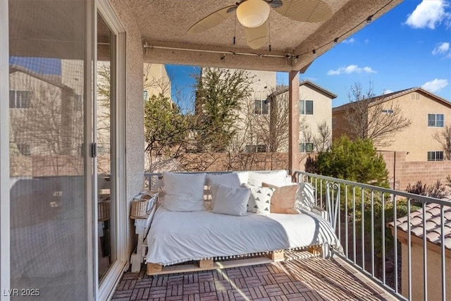 balcony featuring ceiling fan